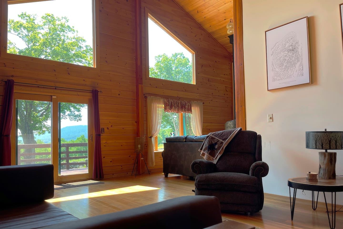 Sitting area in the entry. The Cozy starts here! Huge windows let the mountain views inside!