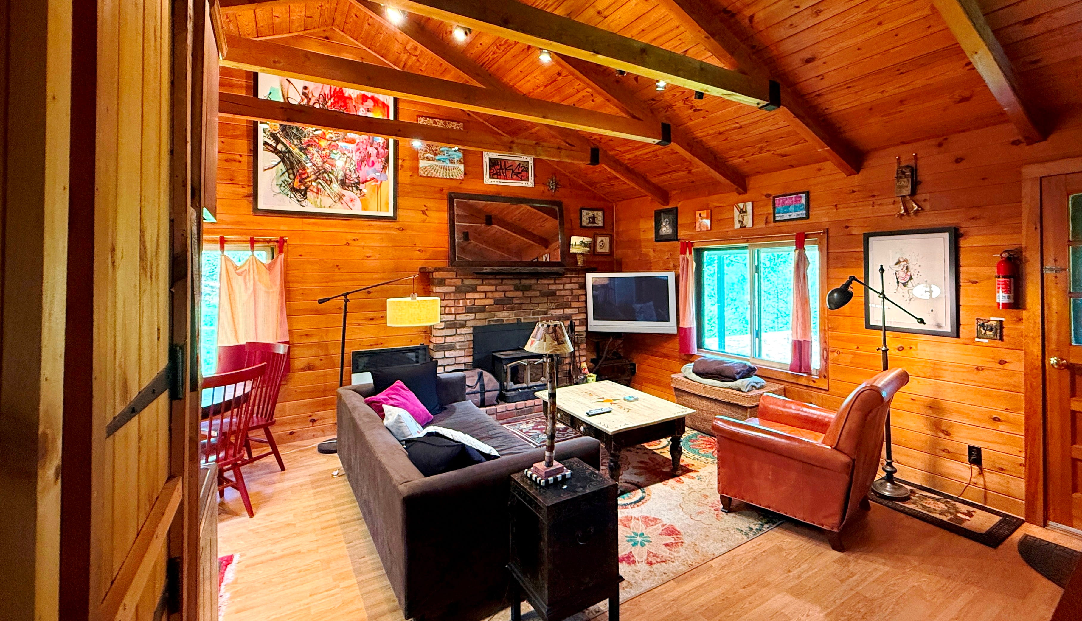 Living Area with wood stove and TV