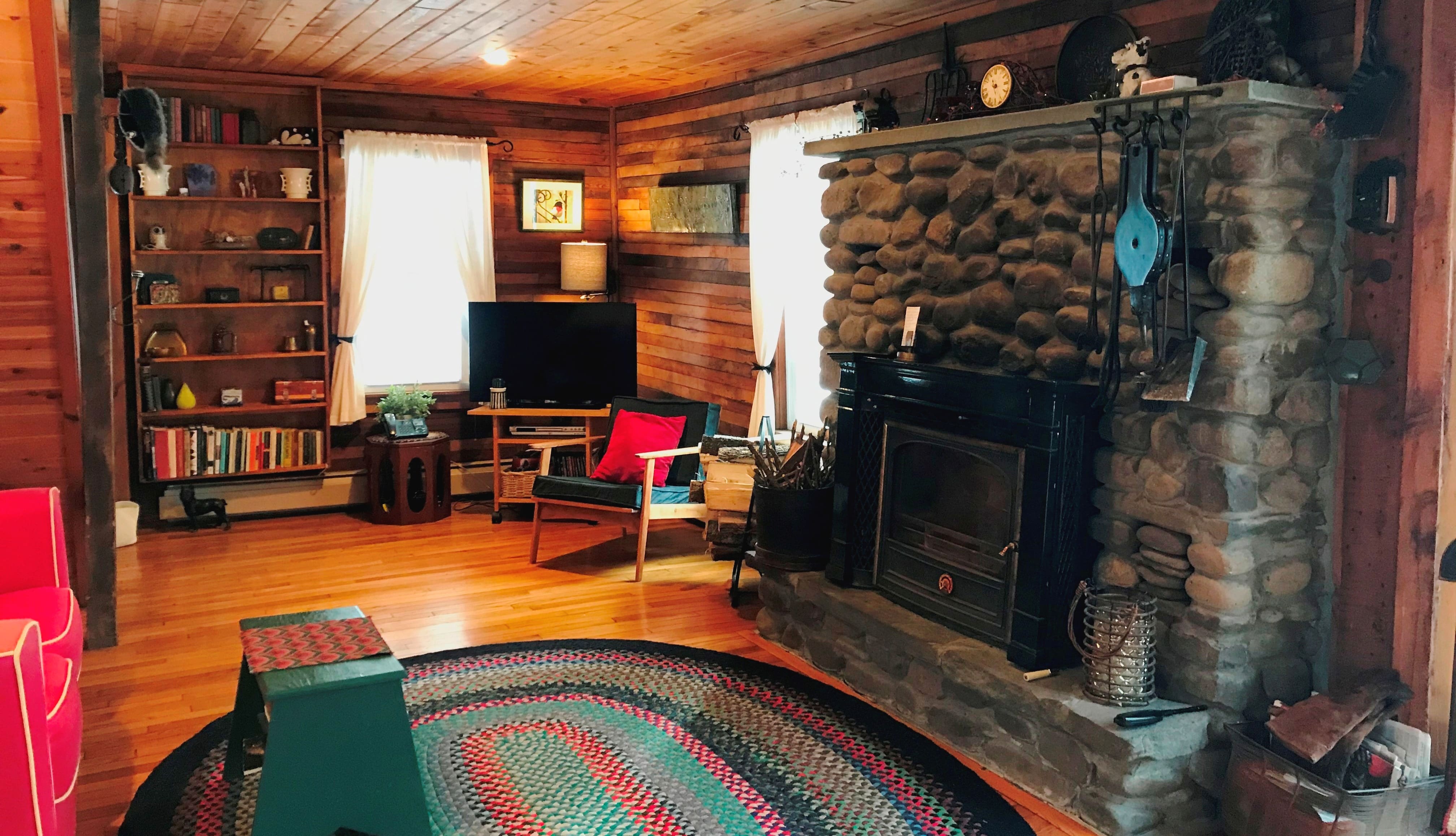Living Room with wood stove and plenty of Country Charm